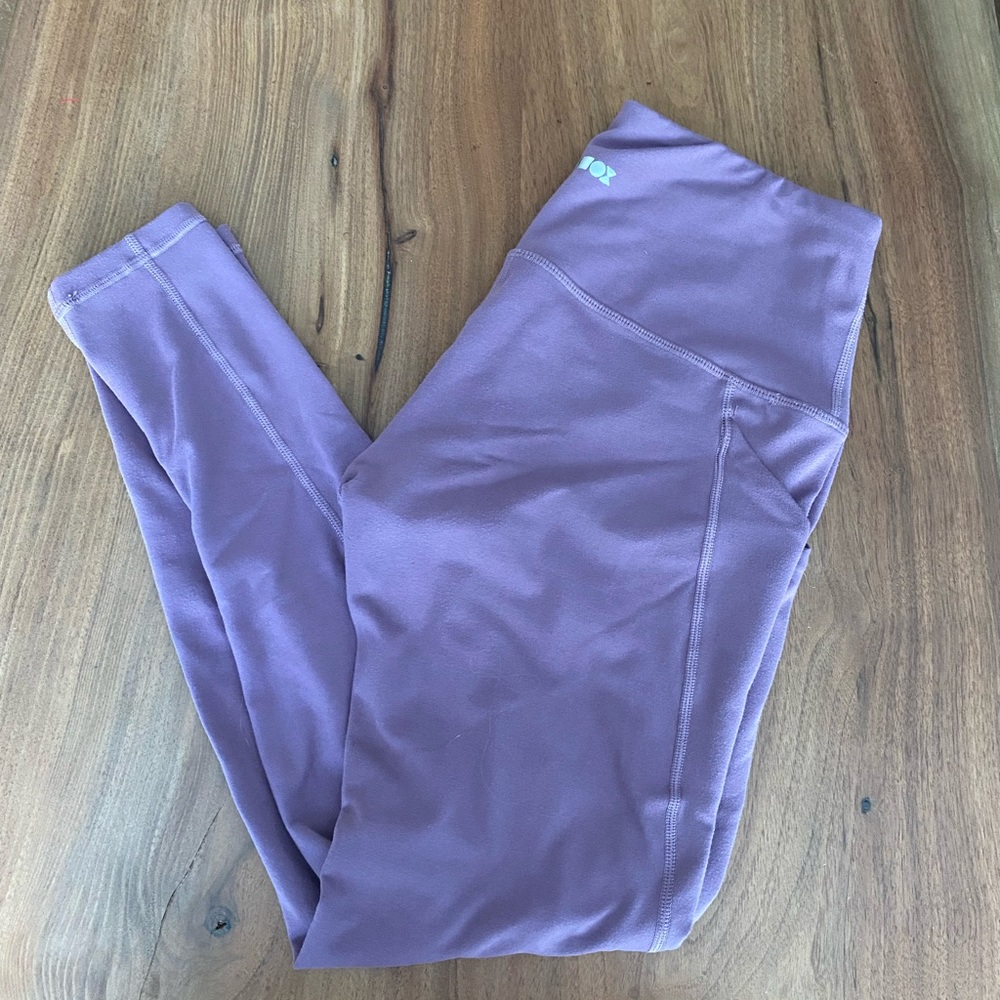 Purple workout pants. Worn a few times, great condition